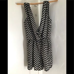 Mini dress low cut front and back.